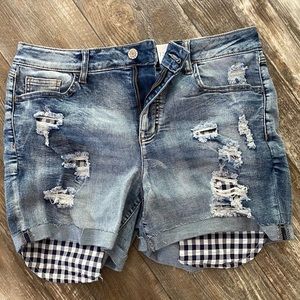Destroyed denim shorts